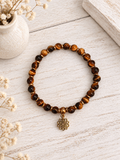 Bracelet en œil de tigre 6mm avec intercalaires en hématite dorée et pendentif mandala en acier inoxydable